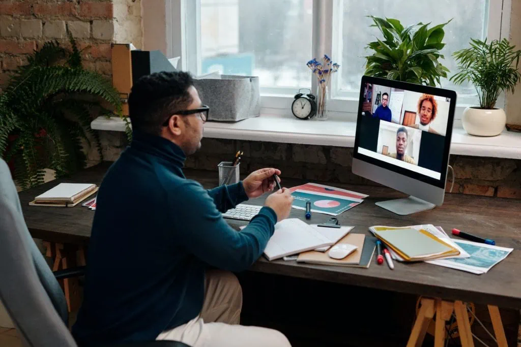 Manager on a Video Call With Remote Team